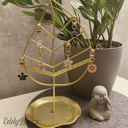 Blumenförmiger Schlüsselanhänger in Orange und Rosa